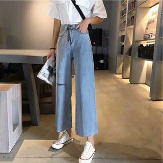 quần jeans ống loe xẻ