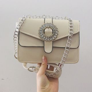 Túi đeo chéo nữ khóa khuy đá