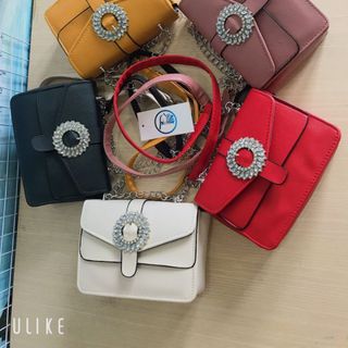 Túi đeo chéo nữ khóa khuy đá