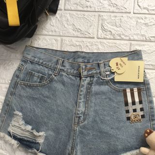 Quần short jeans rách có miếng da bên túi giá sỉ