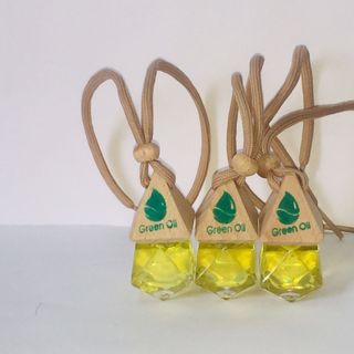 Lọ tinh dầu vỏ quế treo xe Green Oil