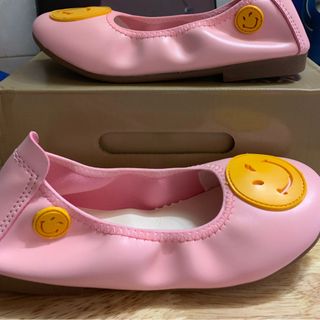 Giày búp bê mặt cười