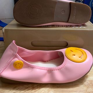 Giày búp bê mặt cười