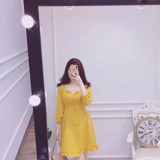 Đầm rã ngực nút bọc