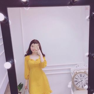 Đầm rã ngực nút bọc