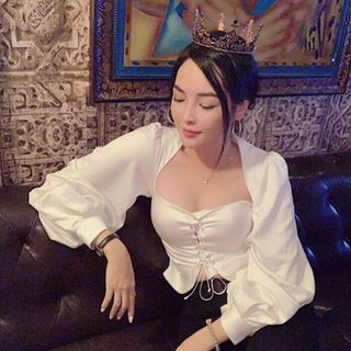 Áo tay phồng nút chéo