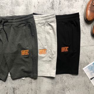 Short thun nỉ thêu chữ màu cam