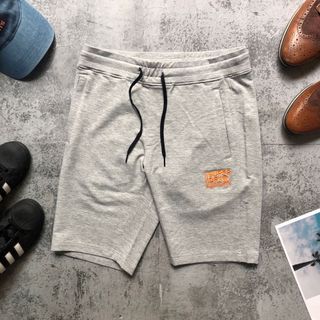 Short thun nỉ thêu chữ màu cam