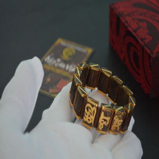 Vòng tay trầm hương sánh chìm bọc vàng non