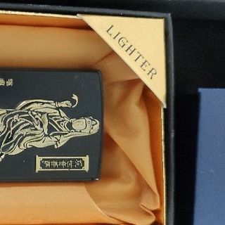 bật lủa hình phật vàng đen