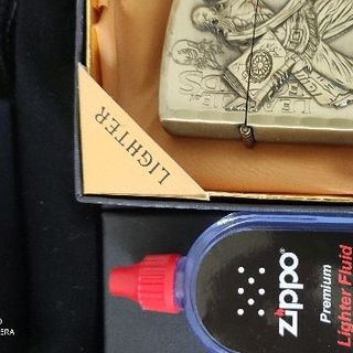 zippo hình nổi sài xăng