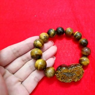 chuỗi đá mắt hổ 12 li