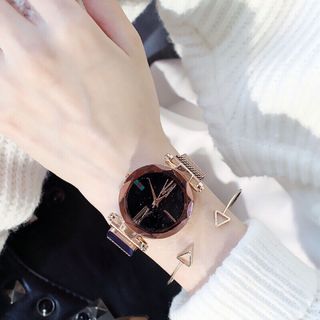 Đồng hồ nam châm nữ