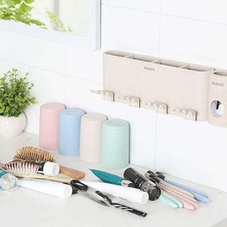 Dụng cụ nhả kem giá treo bàn chải kèm 4 cốc Ecoco
