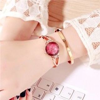 Đông hồ nam dây thép đúc hình rông vàng