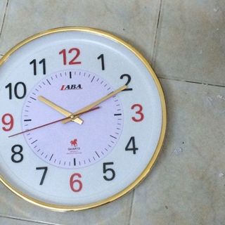 quà tặng doanh nghiệp - in logo đồng hồ treo tường