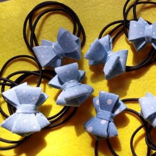 cột tóc nơ xinh xanh