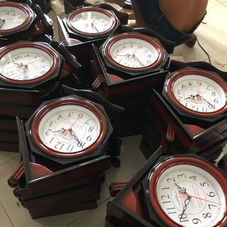 Đồng hồ ngôi nhà in quảng cáo