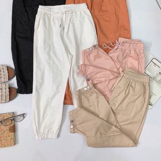 Quần dù jogger bo ống gài nút