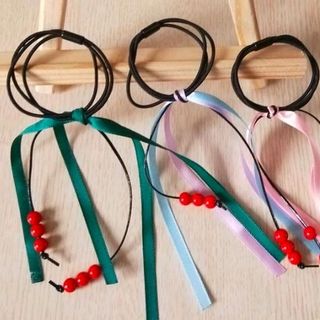 cột tóc phong cách Hàn Quốc mẫu tua ruaa