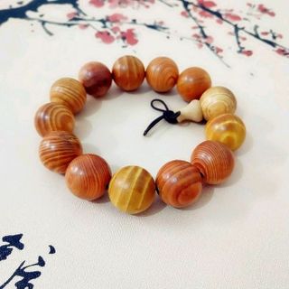 vòng tay huyết long 18mm