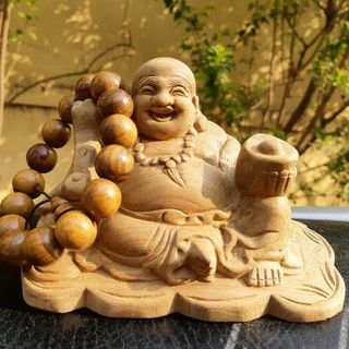 PHẬT DI LẶC ĐỂ XE OTO