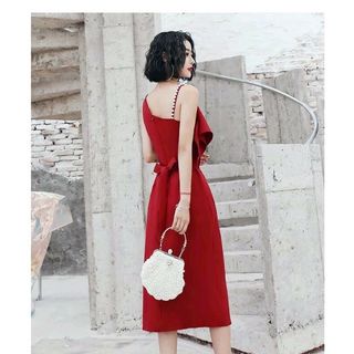 Đầm thun đính nút