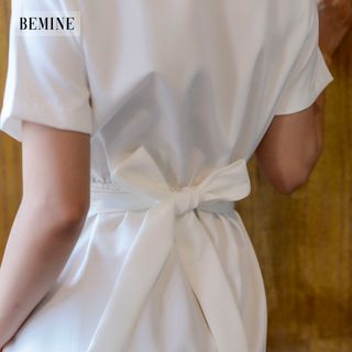 Đầm chun eo hai túi trước