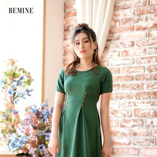Đầm xanh chích ly eo đính nút gỗ