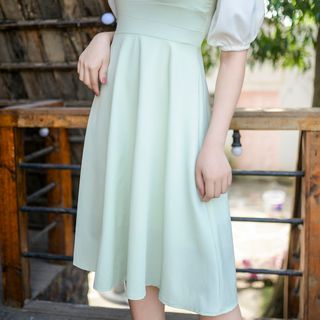 Đầm chạy zizzac thân phối tay trắng