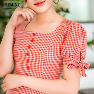 Đầm caro đỏ nơ tay