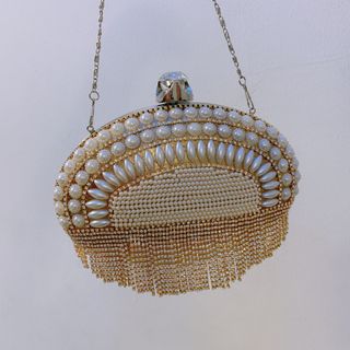 Ví cầm tay xoàn vàng