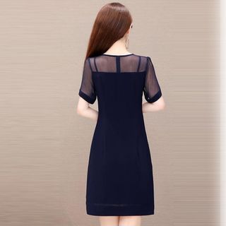 Đầm Xanh Navy Dự Tiệc Phối Lưới Cổ Tim Đính Ngọc