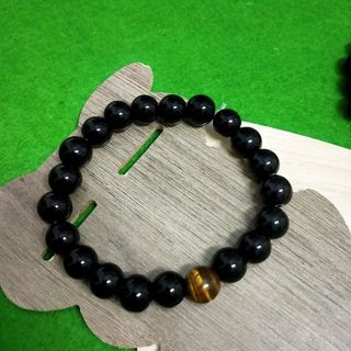 sỉ Chuỗi đeo tay phong thủy đá đen mix đá mắt hổ 10li
Giá sỉ 25k/1 chuỗi