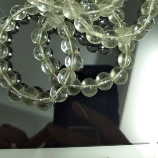Chuỗi đeo tay 10 mm trắng trong suốt