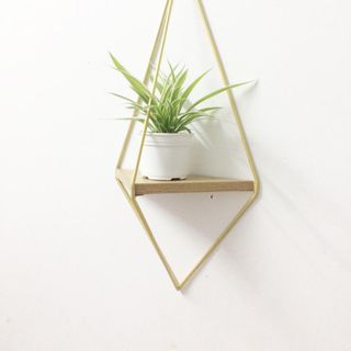 Kệ trang trí sắt mạ vàng hình kim cương