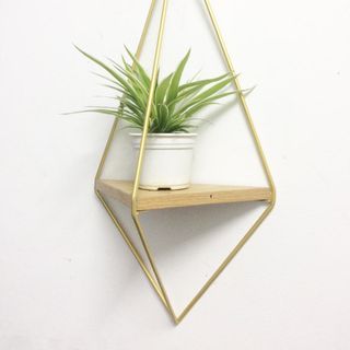 Kệ trang trí sắt mạ vàng hình kim cương