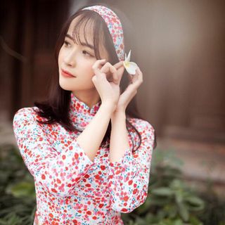 ÁO DÀI TẰM HOA NHÍ