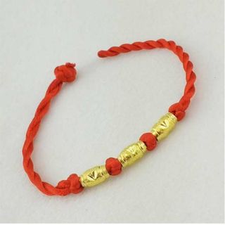 Vòng tay chỉ đỏ hạt vàng
