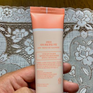Kem dưỡng trắng da Peach Coringco