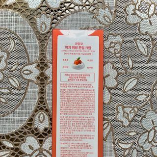 Kem dưỡng trắng da Peach Coringco