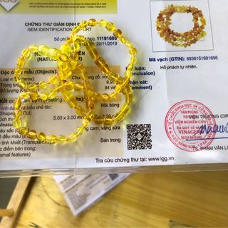 Vòng hổ phách cho bé có nút thắt giữa các hạt an toàn