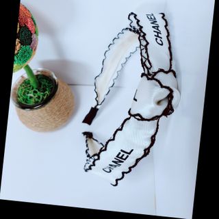 Cài tóc nơ trắng