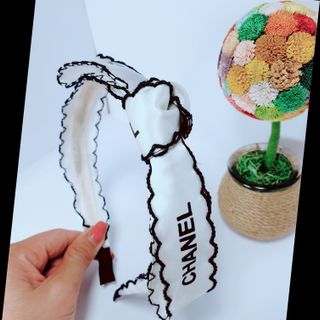Cài tóc nơ trắng