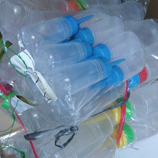Chai nhựa dùng đựng màu khoảng 30ml 1 chai