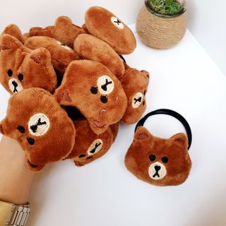 Cột tóc gấu brown