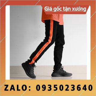 Quần jean nam đen kẻ cam rách gối HCM