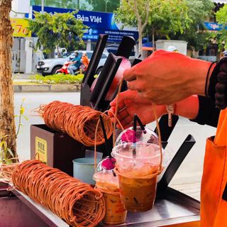 Quai xách ly cho cà phê, trà sữa