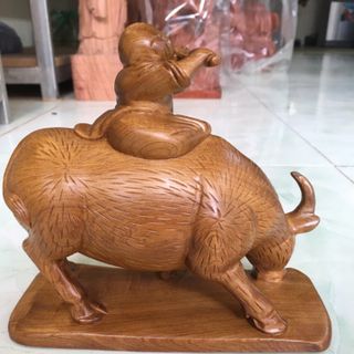Tượng gỗ điêu khác tiểu đồng cưỡi trâu