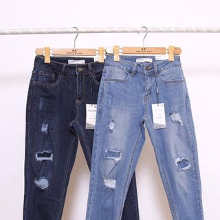 Quần jeans Boyfriend cào rách có may vải ở trong giá sỉ